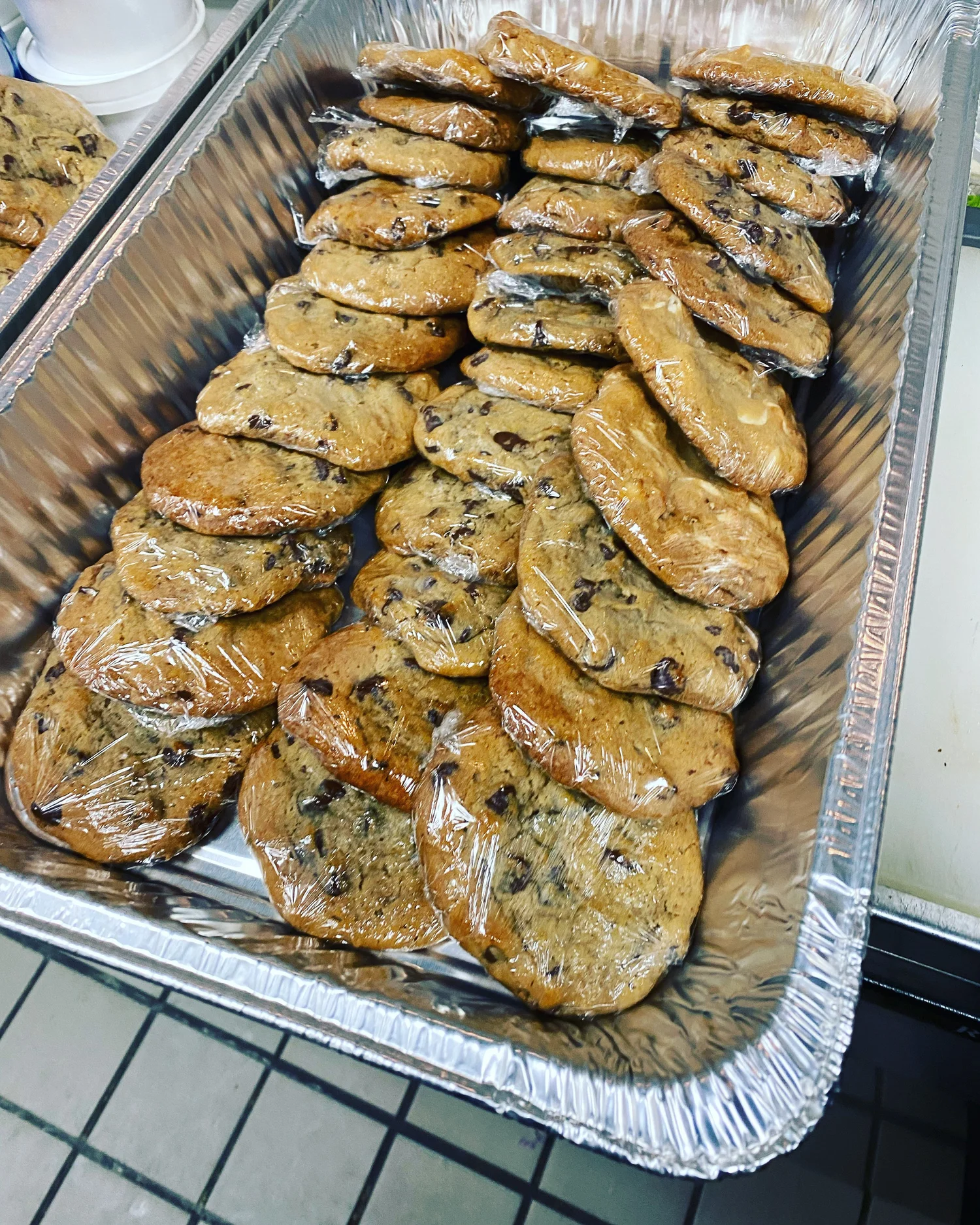 Tray of fresh-baked chocolate chip cookies